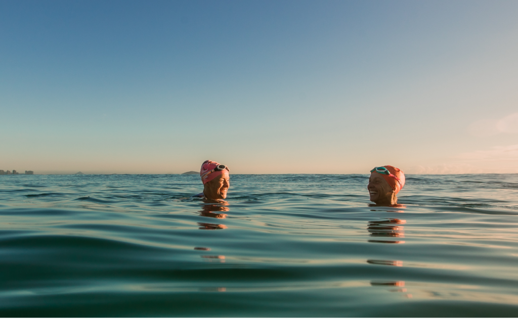two swimmers in the ocean