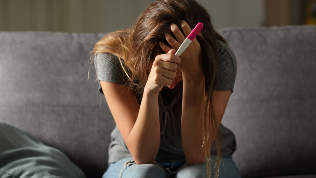 sad pregnancy test photo