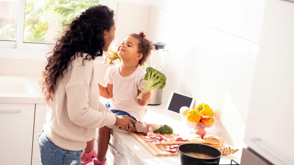 A mum and child together in the kitchen