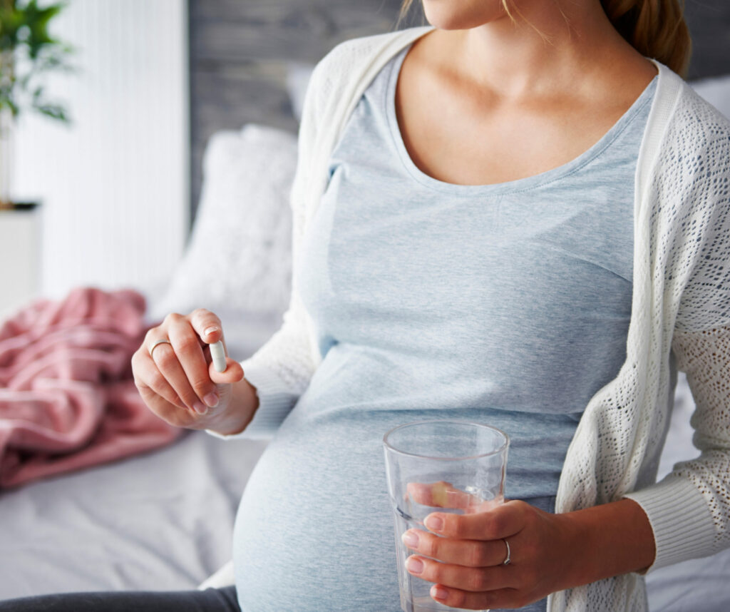 header image; pregnant person